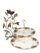 A Royal Albert Old Country Roses two tier cake stand and a Swarovski ornament decorated with