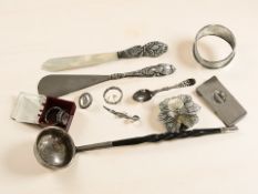 A toddy ladle with wrythen horn handle, a silver napkin ring,