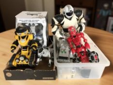 A group of remote controlled toys, dinosaur, robots, etc.