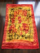 A 1970's shaggy piled rug, 184 cm x 119 cm.