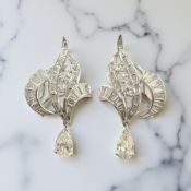 A pair of fine quality platinum diamond earrings,