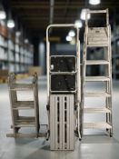 Four various step ladders, extension ladders, etc.