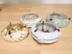 Four various Art Deco modelled glass light shades