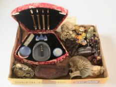 A group of oriental figurines, a Chinese calligraphy set, similar ornaments.