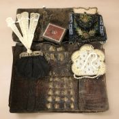 A group of bead work evening bags, a crocodile leather satchel, a snakeskin handbag,