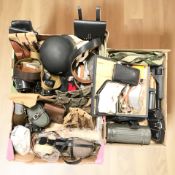 A group of reproduction militaria items including replica pistols, German stick grenade,
