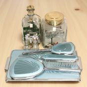 Two Holmegaard decanters, a pair of matching glasses and an enameled dressing table set.