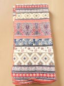 A decorative machine-stitched quilt,