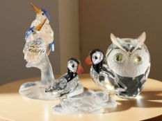 A Swarovski crystal figure of two kingfishers perched on a branch,