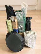 A group of camping items including a gazebo, camping bed, etc.