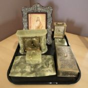 An onyx mantel timepiece, desk stand, ashtray, a further Junghans quartz timepiece,