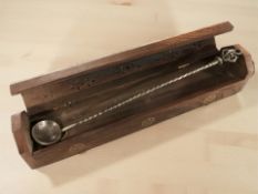 An Ottoman silver sherbet spoon with twist stem, the bowl made from a coin, stamped '80',