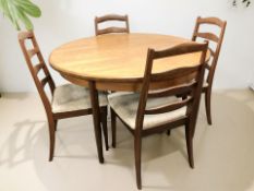 A G Plan teak circular extending dining table with internal leaf, unextended 120 cm diameter,