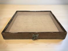 A glazed pine counter top display cabinet and an Atlas Editions Eddie Stobart model.