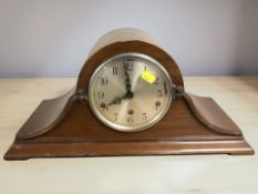 An Edwardian mahogany eight day Napoleon hat mantel clock, with silvered dial, width 49 cm.