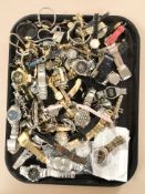 A large quantity of lady's and gent's wristwatches including Pulsar, Geneva, Roman, Trafalgar, etc.