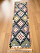 A Maimana Kilim runner, 203 cm x 60 cm.