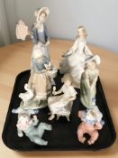 Seven various Lladro and Nao figures. CONDITION REPORT: Some damages.
