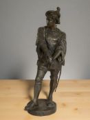 A patinated spelter figure of Quentin Durward, height 40 cm.