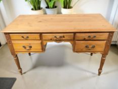 A Jaycee pine five drawer dressing table, 124 cm x 54 cm x 75 cm.