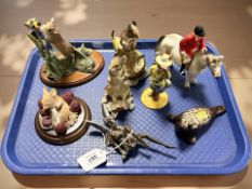 A group of figurines including Royal Doulton, Border Fine Arts, Country Artists, etc.