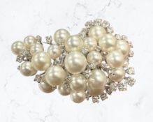 A high quality 18ct white gold pearl and diamond cluster brooch comprising of old European cut