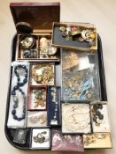 A collection of costume jewellery including various brooches, bead necklaces, simulated turquoise,