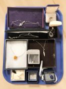 Silver pendants including amber, lapis lazuli and opal examples.