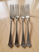 A set of four silver dessert forks, Elkington & Co, Birmingham marks.