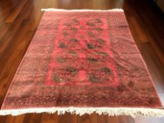 A Turkoman carpet, Afghanistan, 320 cm x 225 cm.