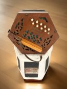 A continental Universe ten button concertina.