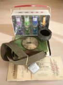 A Bentima Art Deco eight day mantel timepiece, three albums of cigarette cards,