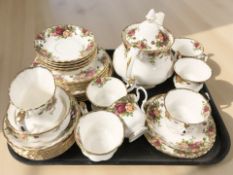 Thirty-three pieces of Royal Albert Old Country Roses tea porcelain.