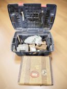 A large plastic tool chest containing various hardware, together with a vintage luggage case.