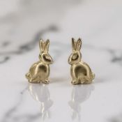 A small pair of 9ct gold rabbit ear studs, height 0.8cm CONDITION REPORT: 0.