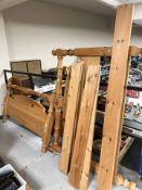 A contemporary pine double bed frame