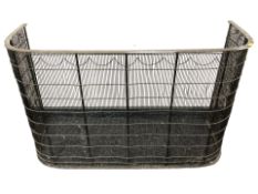 A Victorian brass and steel spark guard,