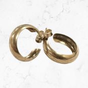 A pair of 9ct gold hoop earrings CONDITION REPORT: 1.