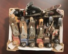 Eight various woodworking planes including Acorn, Stanley, Footprint, etc.