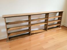 A 20th century oak open bookcase with adjustable shelves,