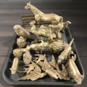 A group of brass animal ornaments.