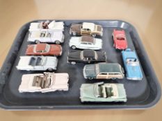 Twelve Franklin Mint precision models die cast classic cars.