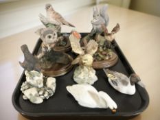 A group of bird ornaments including Border Fine Arts and Country Artists, Beswick and Coalport.