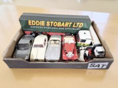Four Bburago and other die cast scale model cars to include 1/18 scale Jaguar E 1961 and a Mercedes