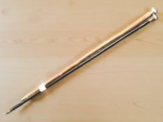 Two swagger sticks with silver caps.
