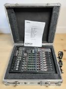 A Yamaha MG12X mixing console, in flight case with power lead and instruction manual.