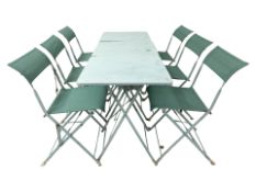 Three enameled metal folding garden tables, each 60 cm wide, and three pairs of folding chairs.