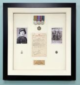 A framed montage of military decorations and ephemera relating to W/28344 Sjt.