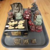 A group of oriental resin figures, trinket box, figure of a miner, set of graduated pyramids,