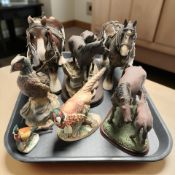 A group of china shire horses, Border Fine Arts pottery pheasant, etc.